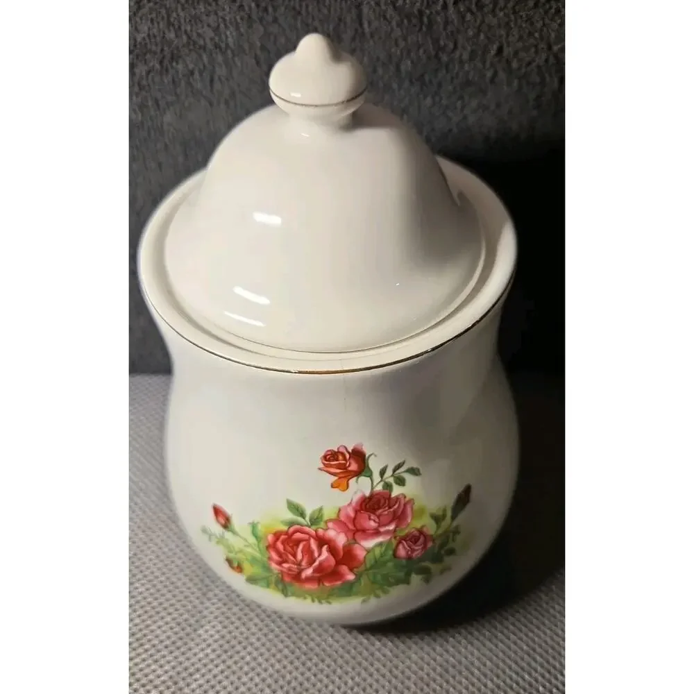 White ceramic lidded jar with hand-painted roses and gold trim 9.5 In
